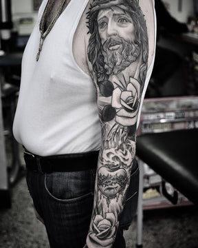 Black and Grey Religious Full Sleeve Tattoo By Pablo Morte