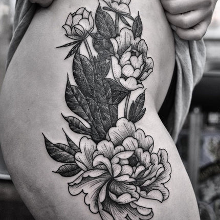 Large Cover up Tattoo on side hip by Chris Jones