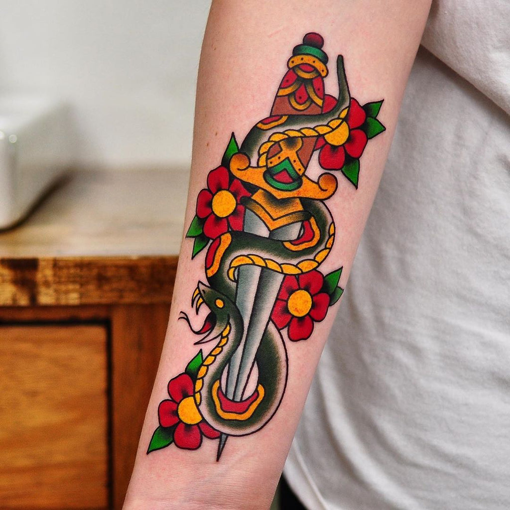 american traditional dagger tattoo
