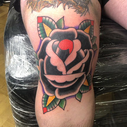 Black Rose on The Knee By Jackson Liversidge