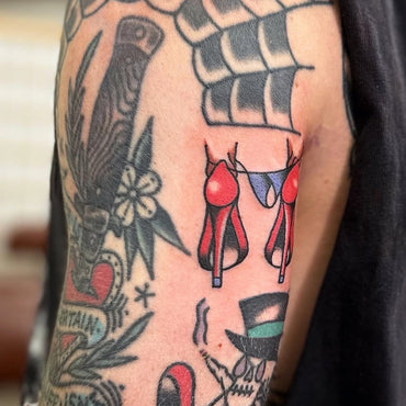 Red Heels Gap filler Tattoo By Lewis Hussey
