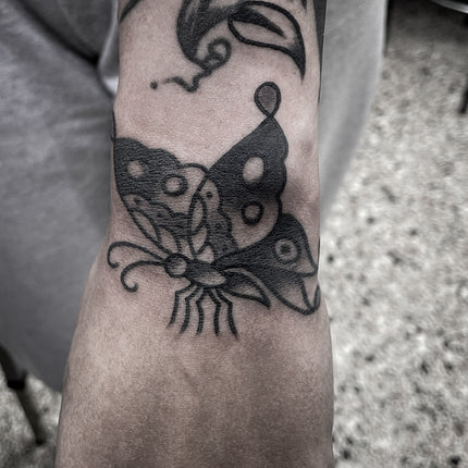 Butterfly Hand Tattoo by Jimmy Lachmund