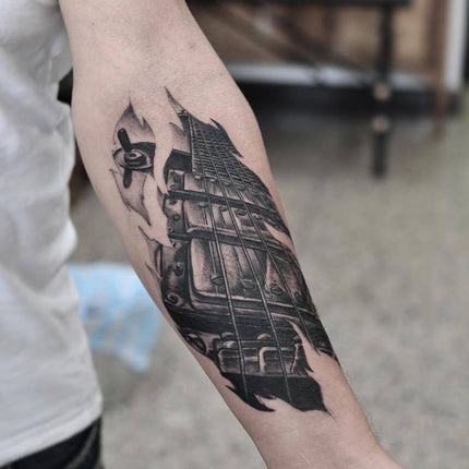 Triple humbucker Les Paul tattoo in black and grey