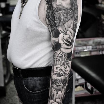 Black and Grey Religious Full Sleeve Tattoo By Pablo Morte
