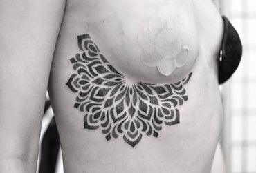 Sternum Dotwork Mandala Tattoo Done by Chris Jones