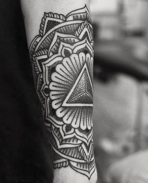 Bold Dotwork Mandala Tattoo by Chris Jons