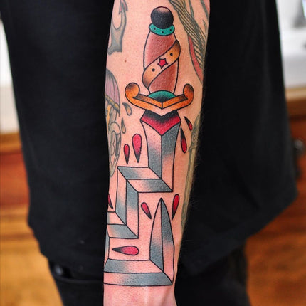 Classic dagger Tattoo done with a twist by Kane Berry