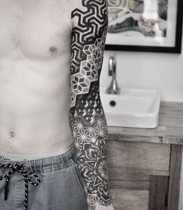 Amazing Pattern Work Tattoo done by Chris Jones