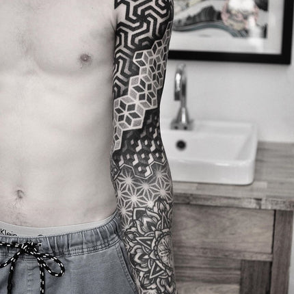 Amazing Pattern Work Tattoo done by Chris Jones