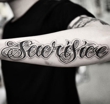 Script Tattoo Across the Forearm By Pablo Morte