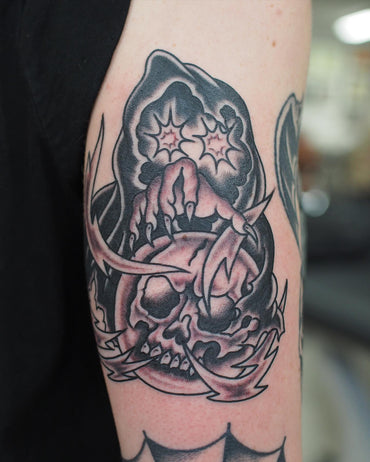 Reaper with a Crystal Ball Tattooed by Lachie Grenfell