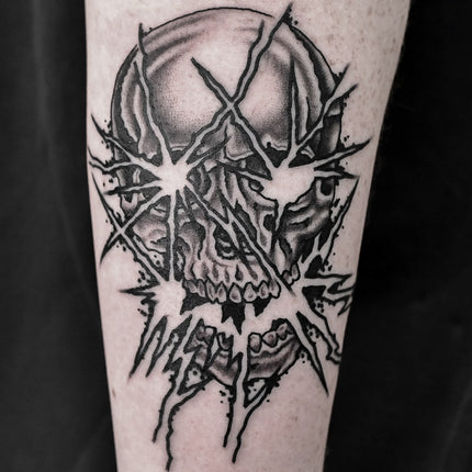 Blackwork Skull Tattoo by Lachie Grenfell