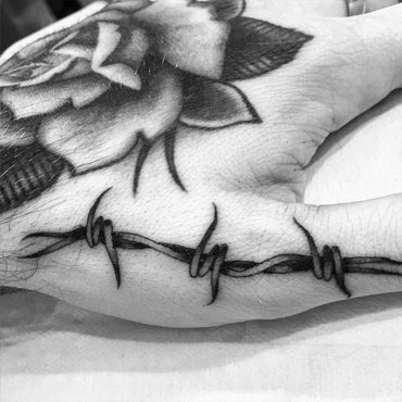 Barbed Wire Hand Tattoo